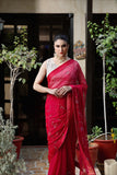 Maroon chiffon saree with contrasting white & gold blouse